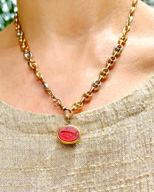 Vintage yellow 18K carved carnelian aquatic animal pebble pendants