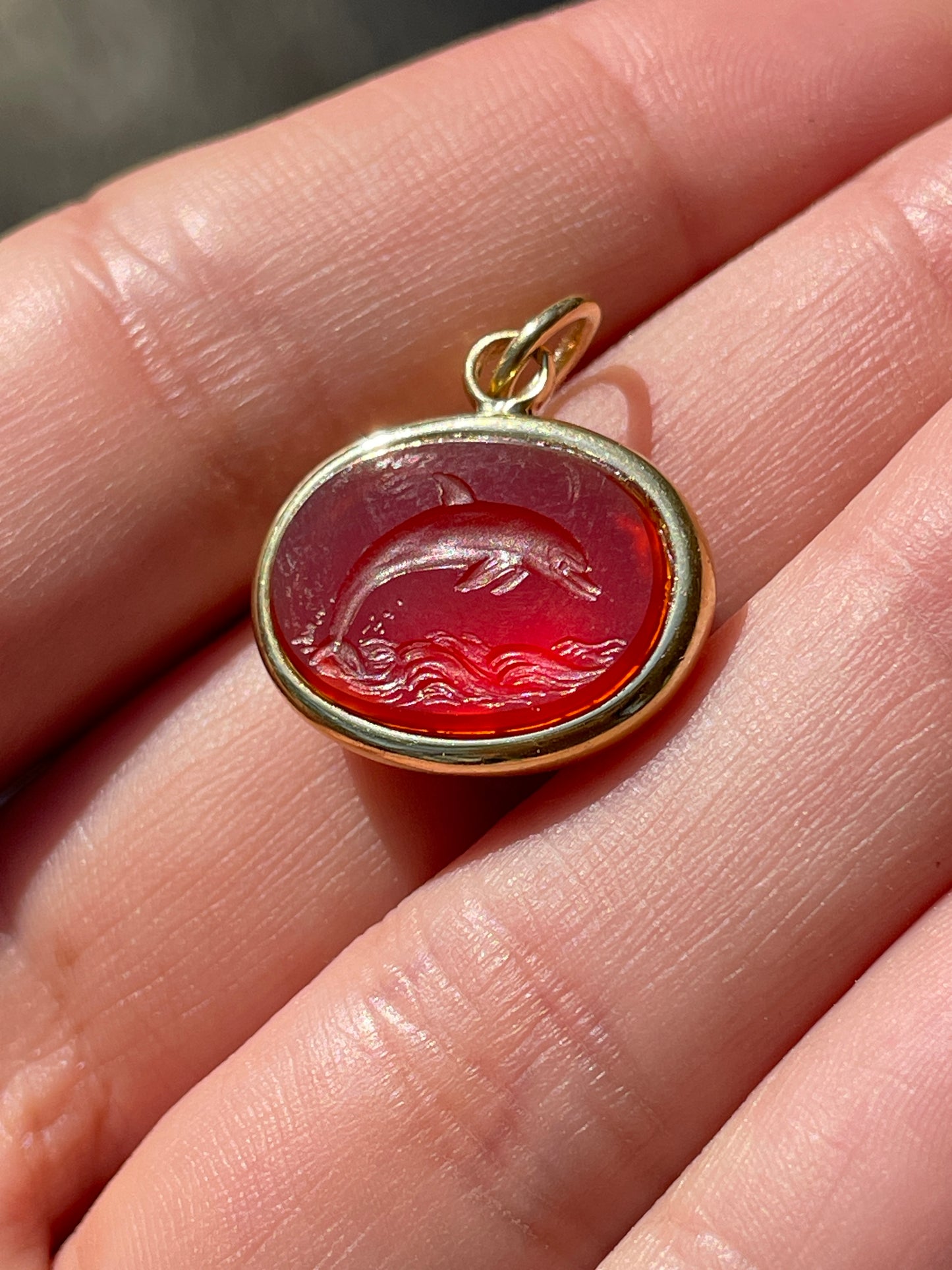 Vintage yellow 18K carved carnelian aquatic animal pebble pendants