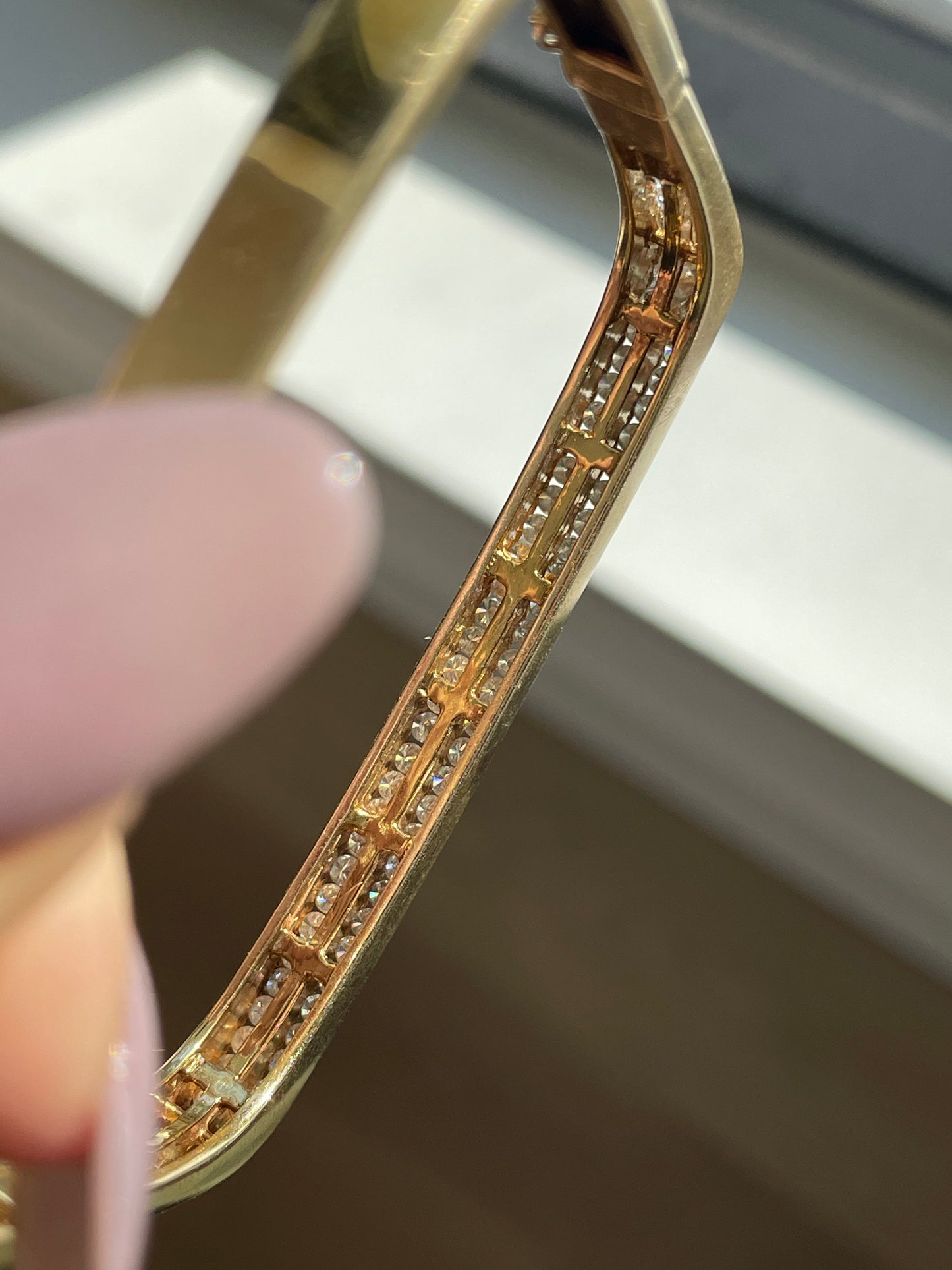 Vintage yellow 14K gold 1.2 ctw channel set diamond squared hinge bangle