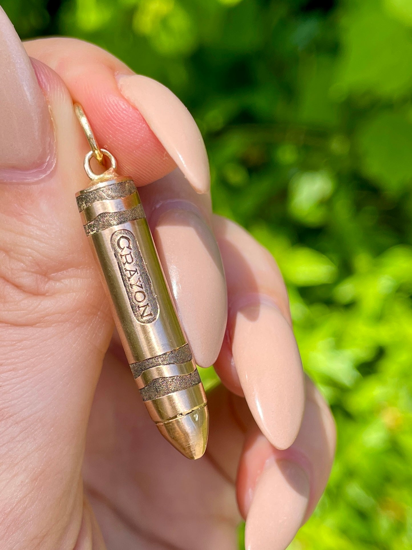 Vintage rosy yellow 10K gold engraved crayon pendant