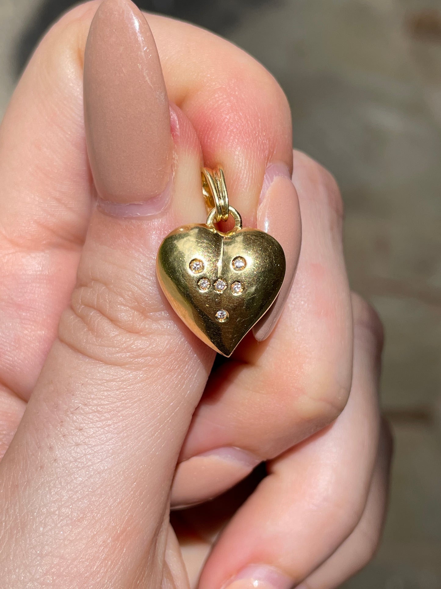 Vintage yellow 18K .08ctw diamond heart pendant