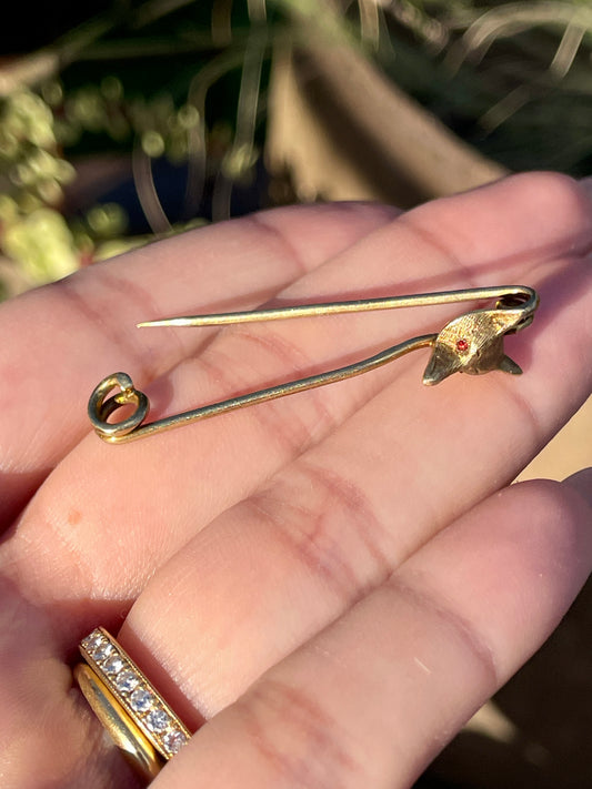 Antique yellow 14K fox safety pin with garnet eyes