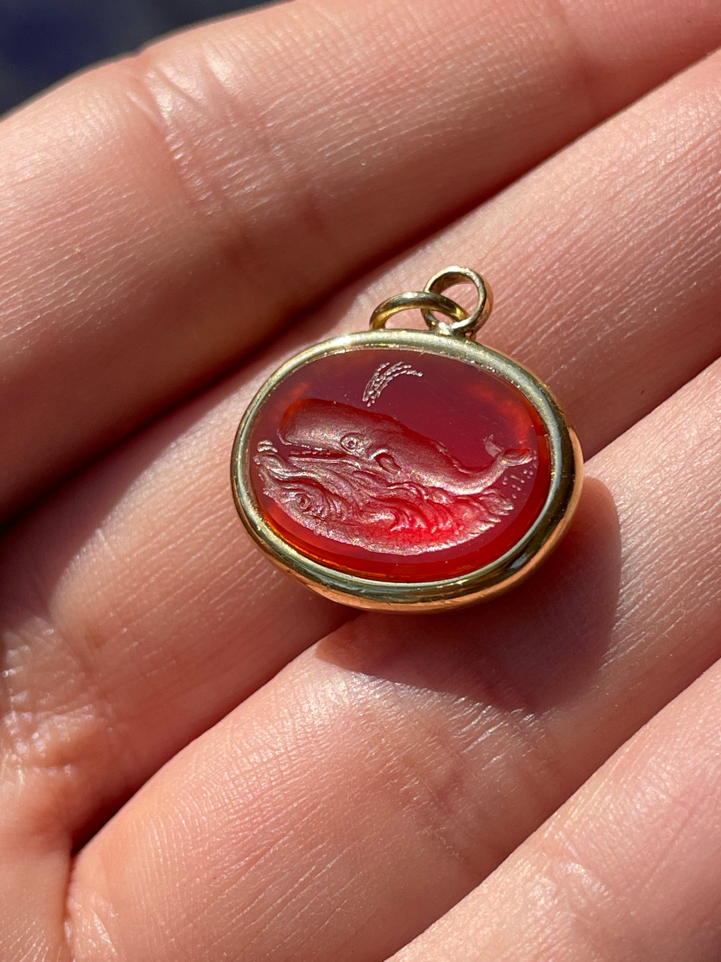 Vintage yellow 18K carved carnelian aquatic animal pebble pendants
