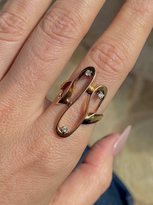 Vintage yellow 14K .11 ctw diamond wave statement ring, size 8.25