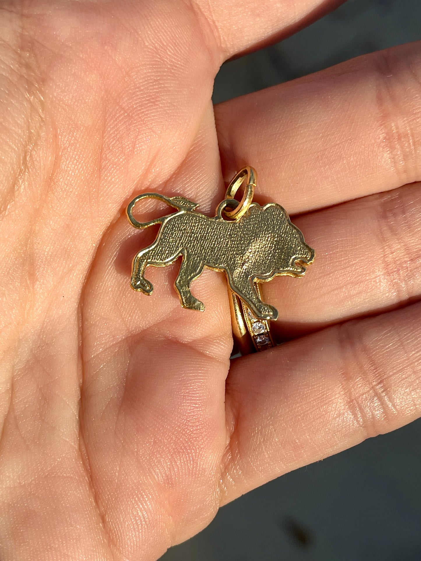 Vintage yellow 18K red enamel lion pendant