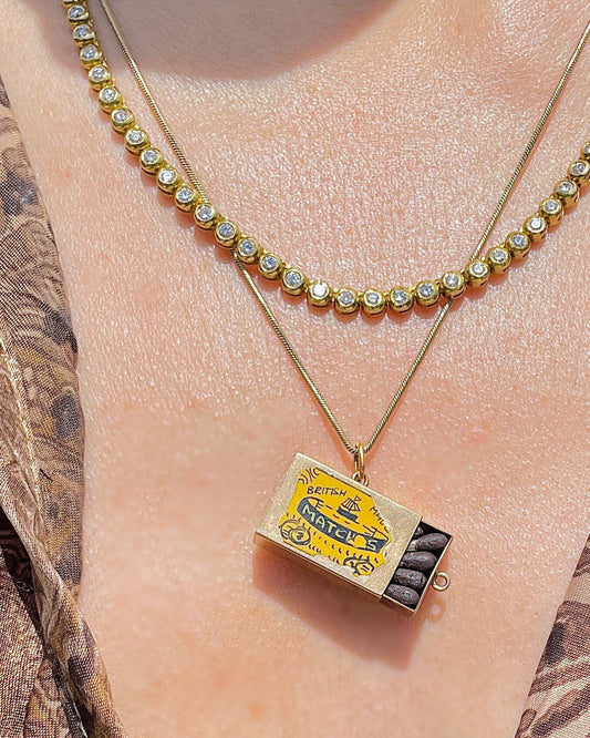 Vintage yellow 9K articulated British matches box pendant