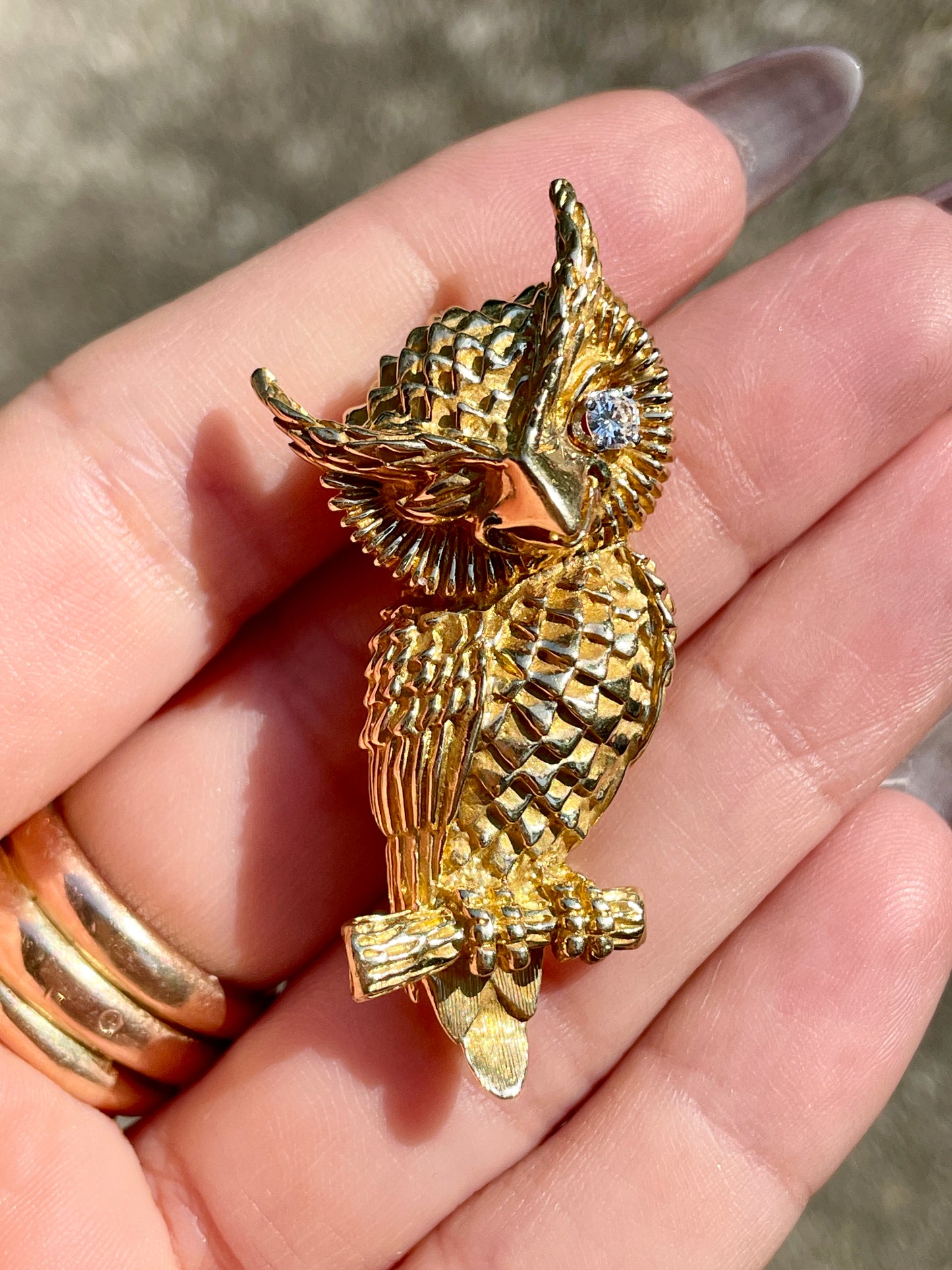 Vintage yellow 14K and approx .12 ctw diamond Dan Frere winking owl pin, 2 inch