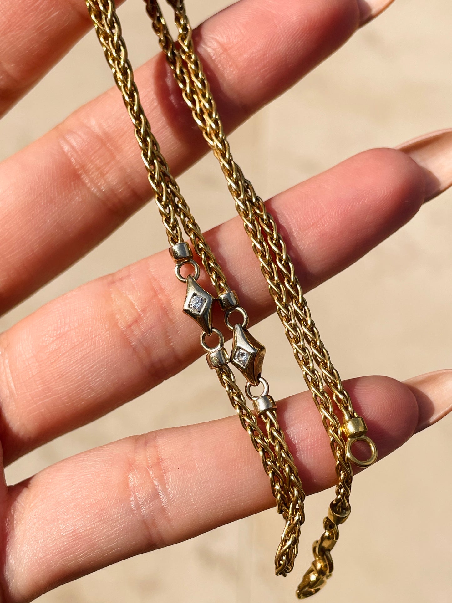 Vintage yellow 18K double sided .16 ctw diamond station wheat chain necklace, 17.75 inch