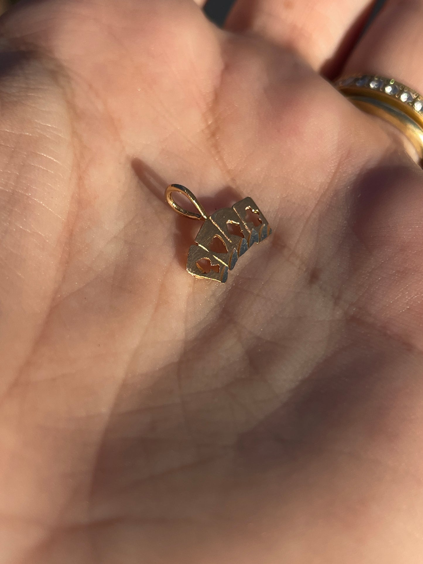 Vintage yellow 14K card suits charm