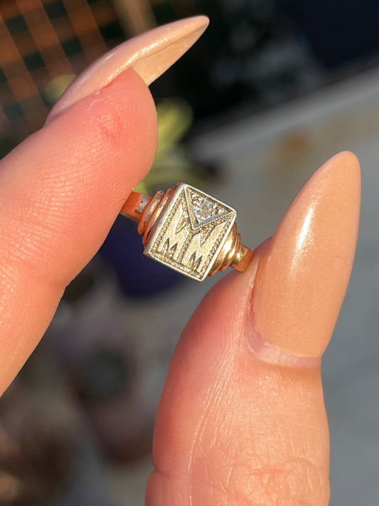 Antique yellow and white 14K "MM" signet with .03 ctw diamond ring, size 3