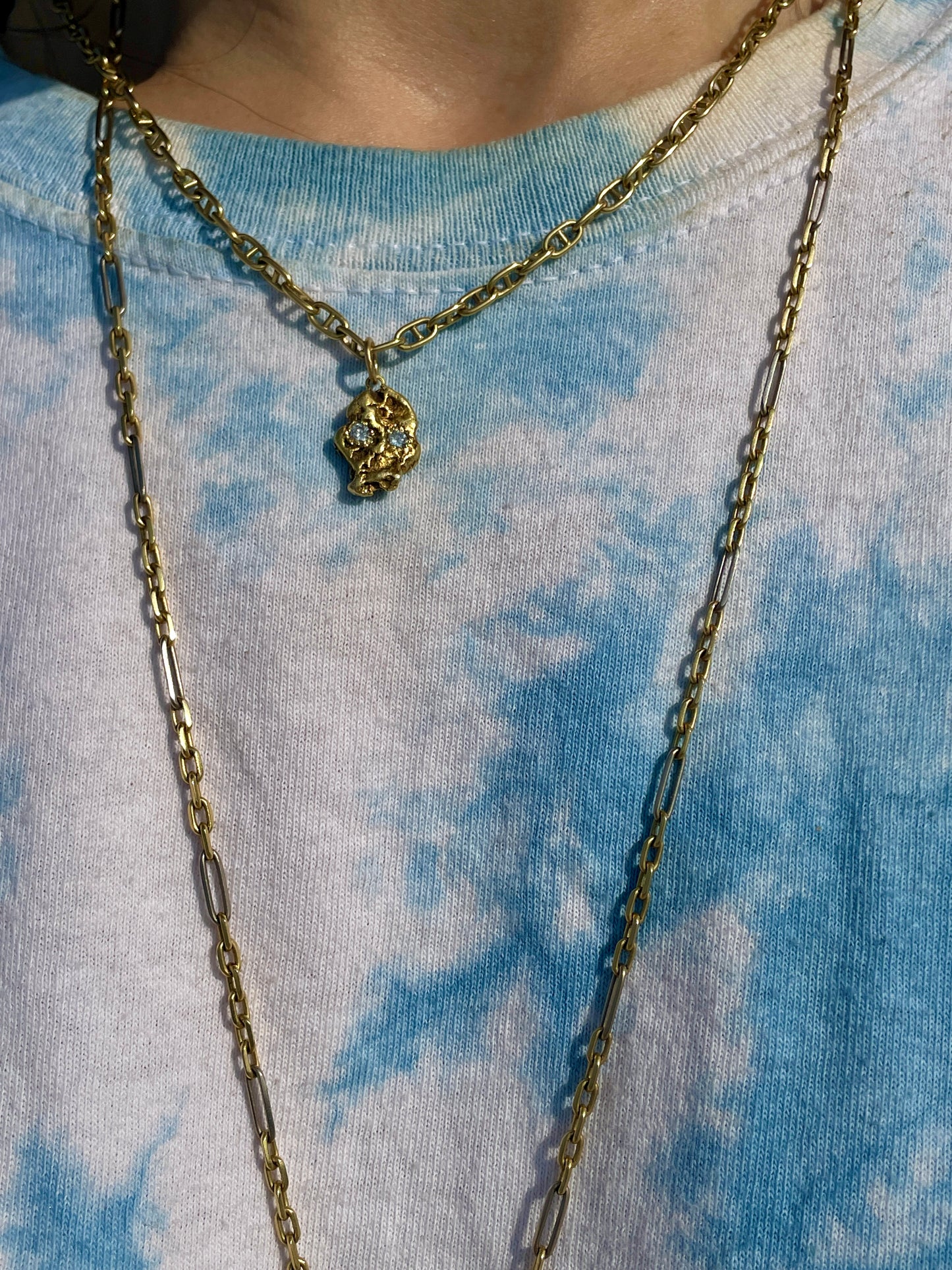 Vintage yellow 18K to 24K gold nugget skull with .12 ctw diamonds charm