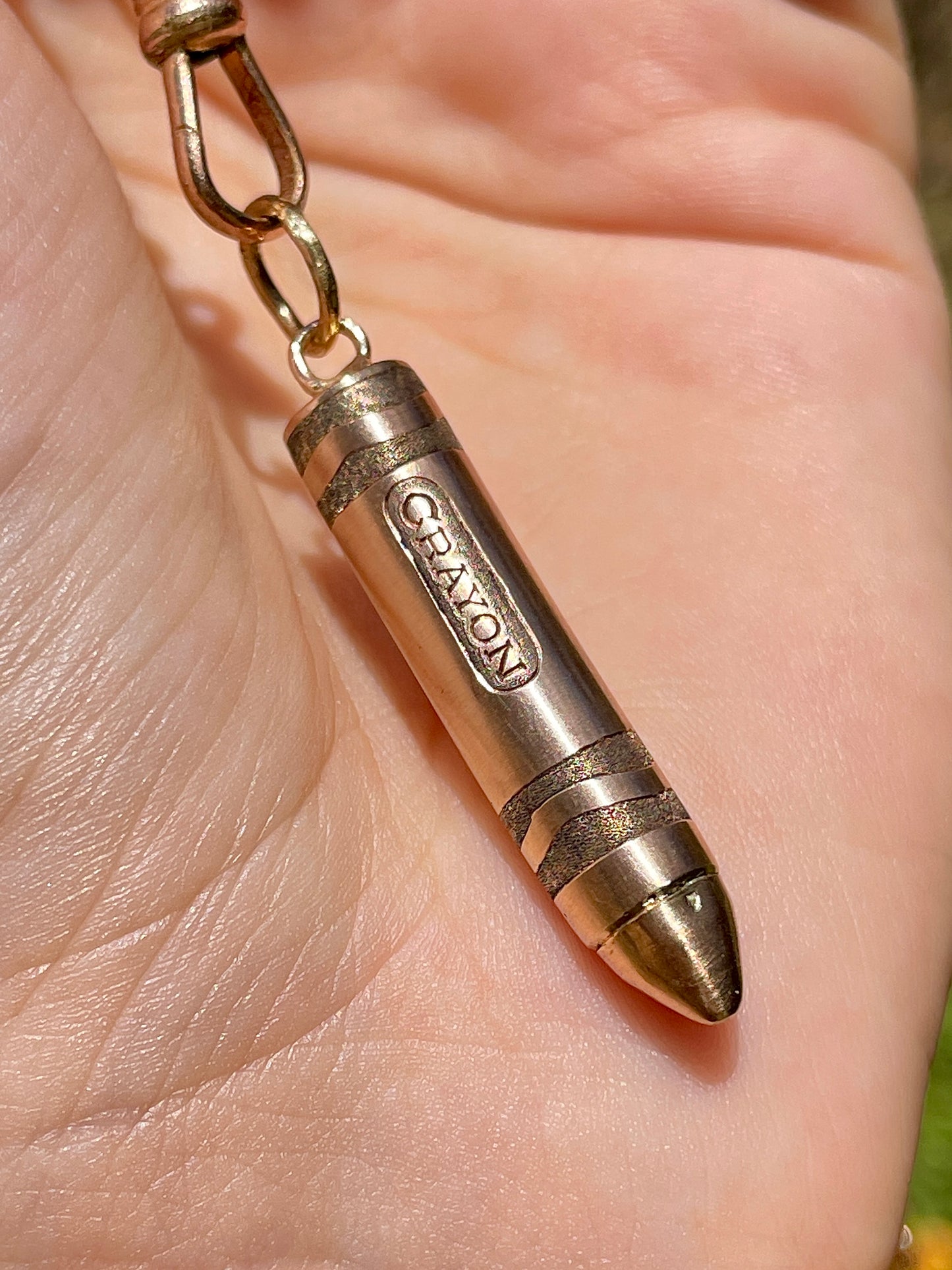 Vintage rosy yellow 10K gold engraved crayon pendant