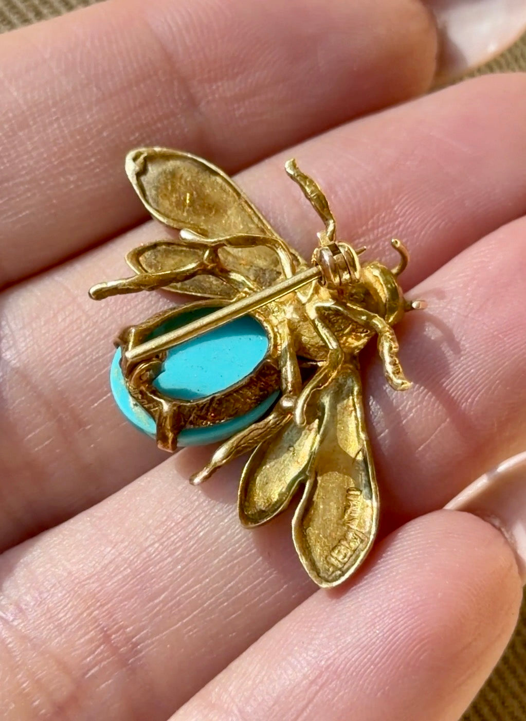 Vintage yellow 18K bee pin with turquoise cabochon