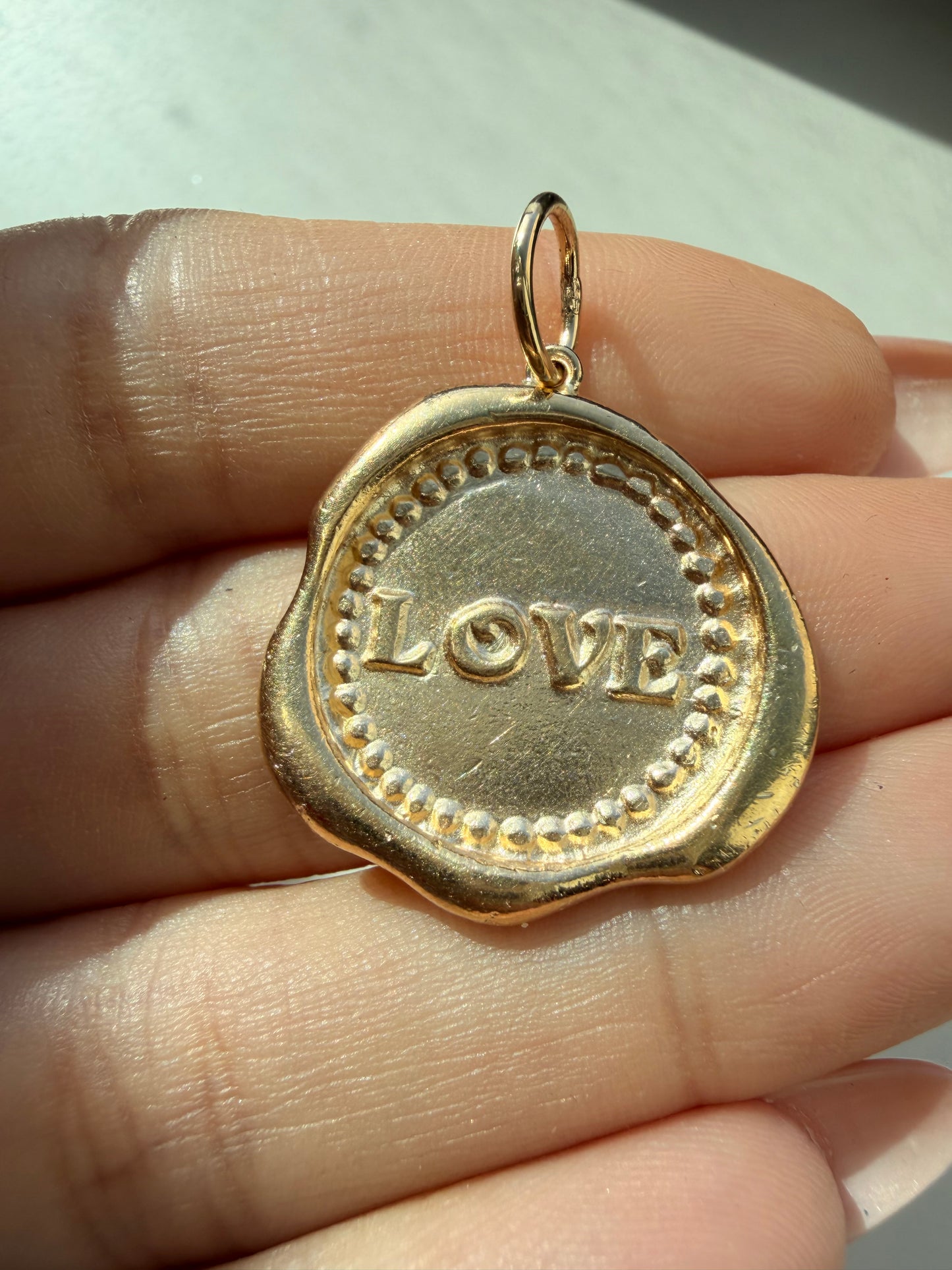 Vintage yellow 14K LOVE stamp medal pendant