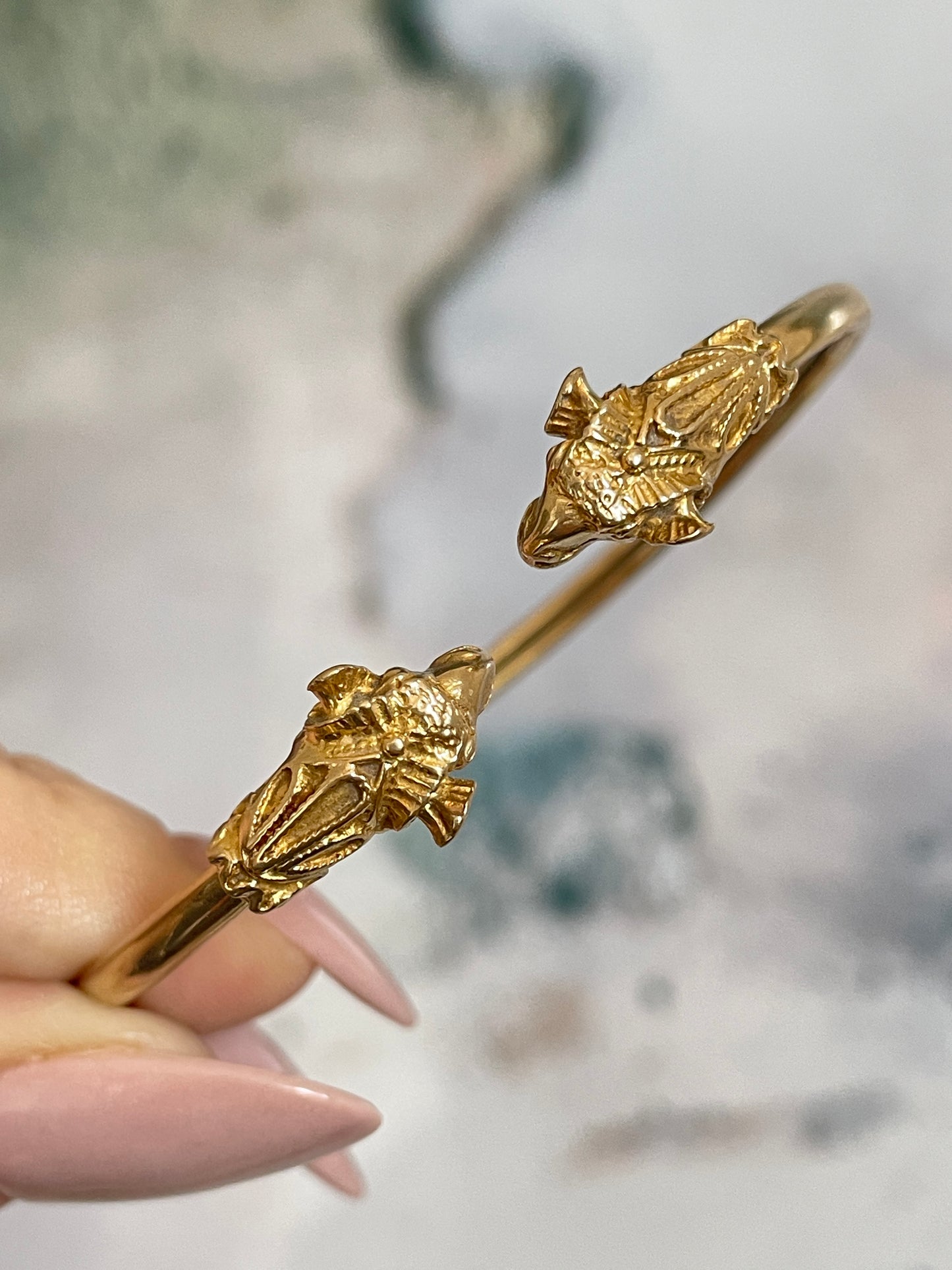 Vintage yellow 14K gold ram heads bangle