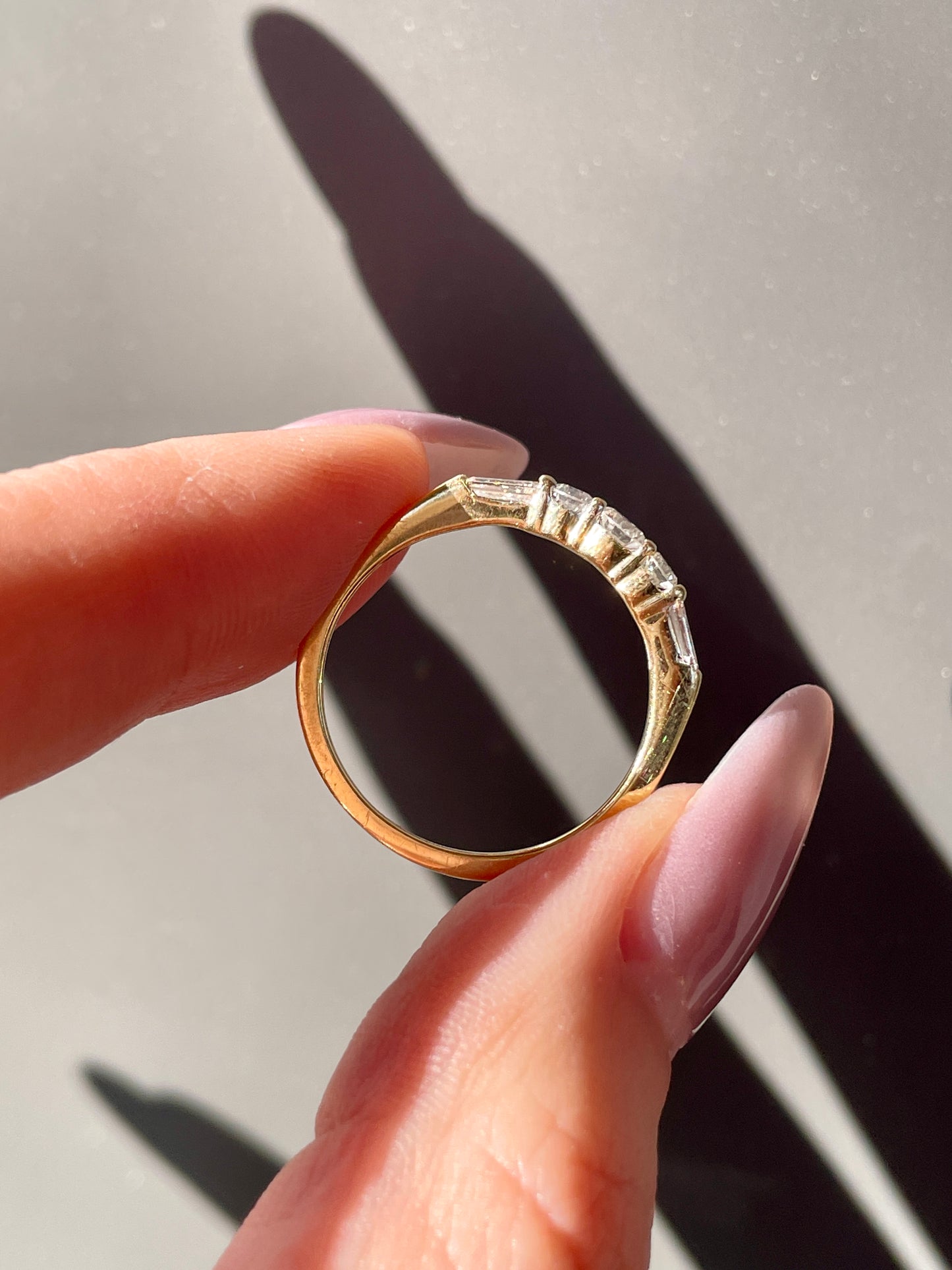 Vintage yellow 14K approx .54 ctw baguette and round diamond ring, size 7.25