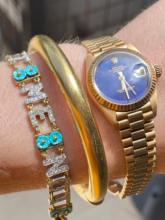 Vintage yellow 18K round heavy hinge bangle