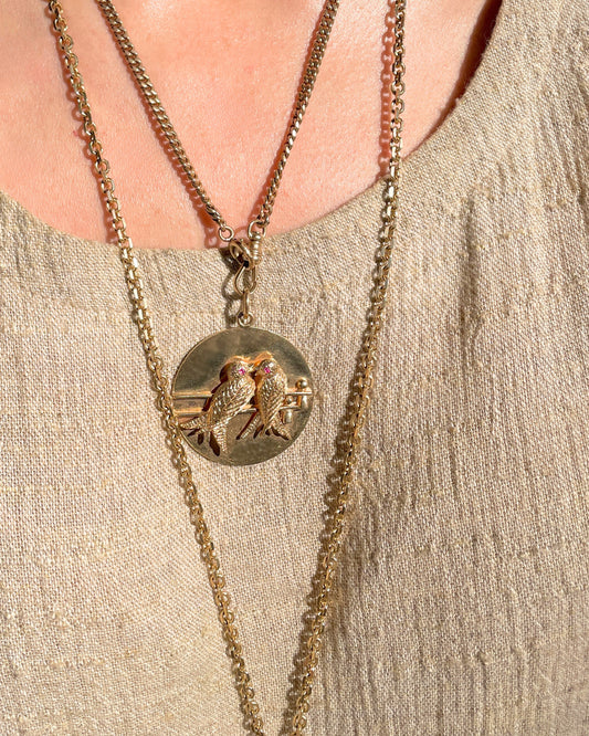 Vintage 14K gold Midcentury Tiffany & Co Lovebirds medallion with rubies