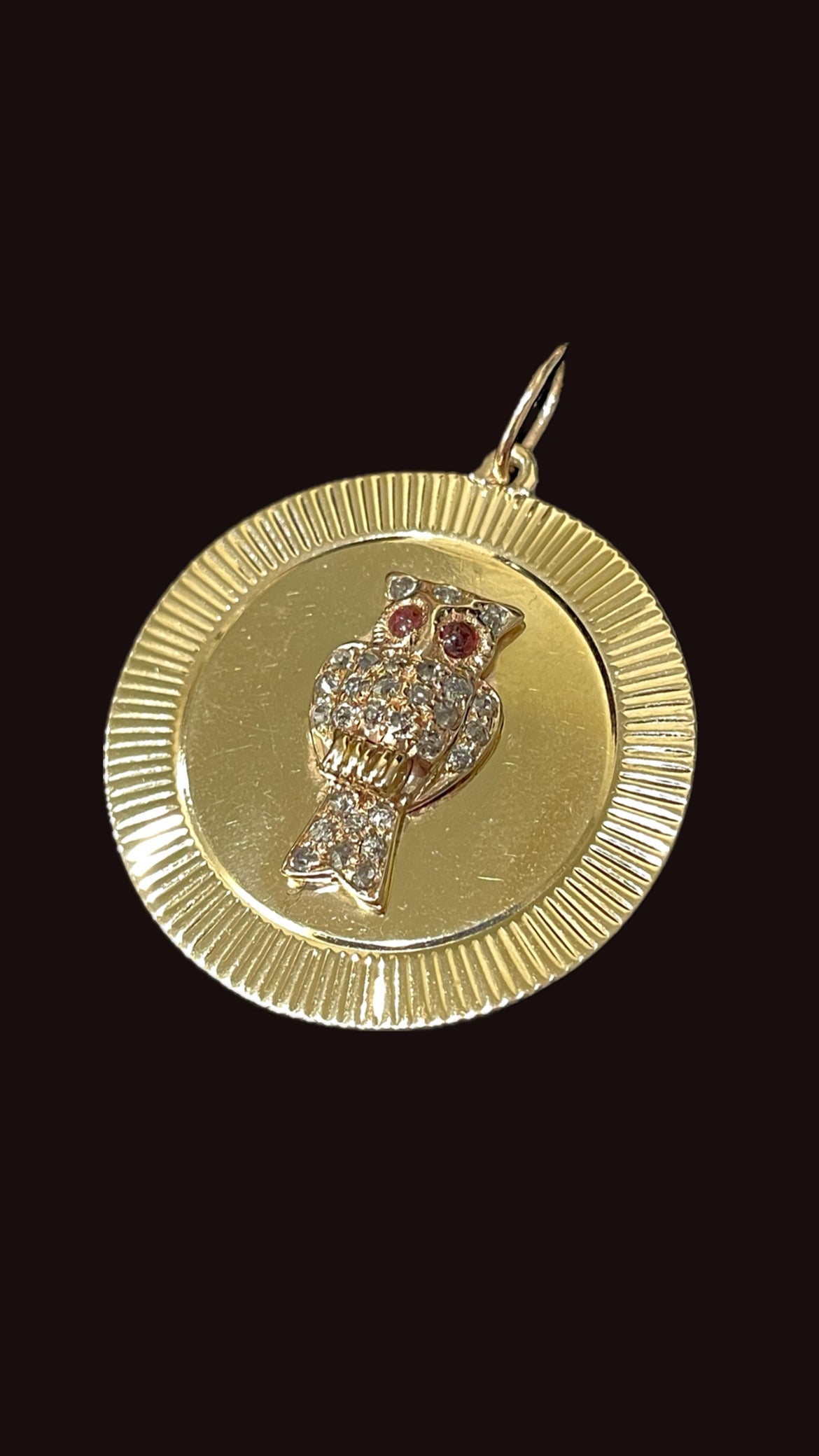Vintage yellow 14K gold .3ctw old mine, old cut and rose cut diamond owl with garnet eyes engine turned pendant