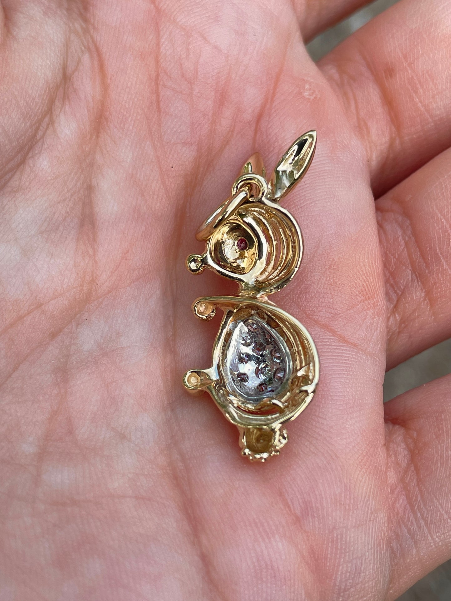 Vintage yellow 14K approx .2 ctw diamond and ruby rabbit pendant