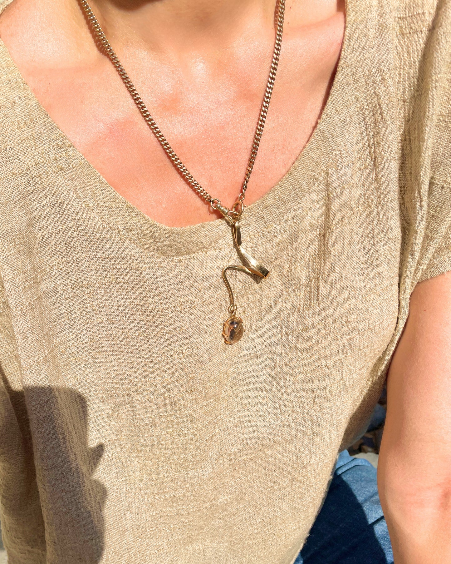 Vintage yellow 14K rutilated quartz zig zag pendant