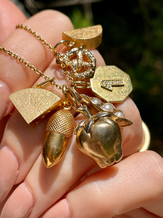 Vintage yellow 10K gold salted pretzel charm