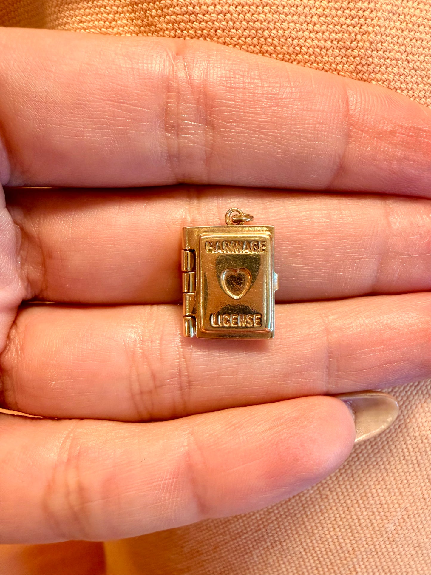 Vintage yellow 14K gold articulated marriage license book charm
