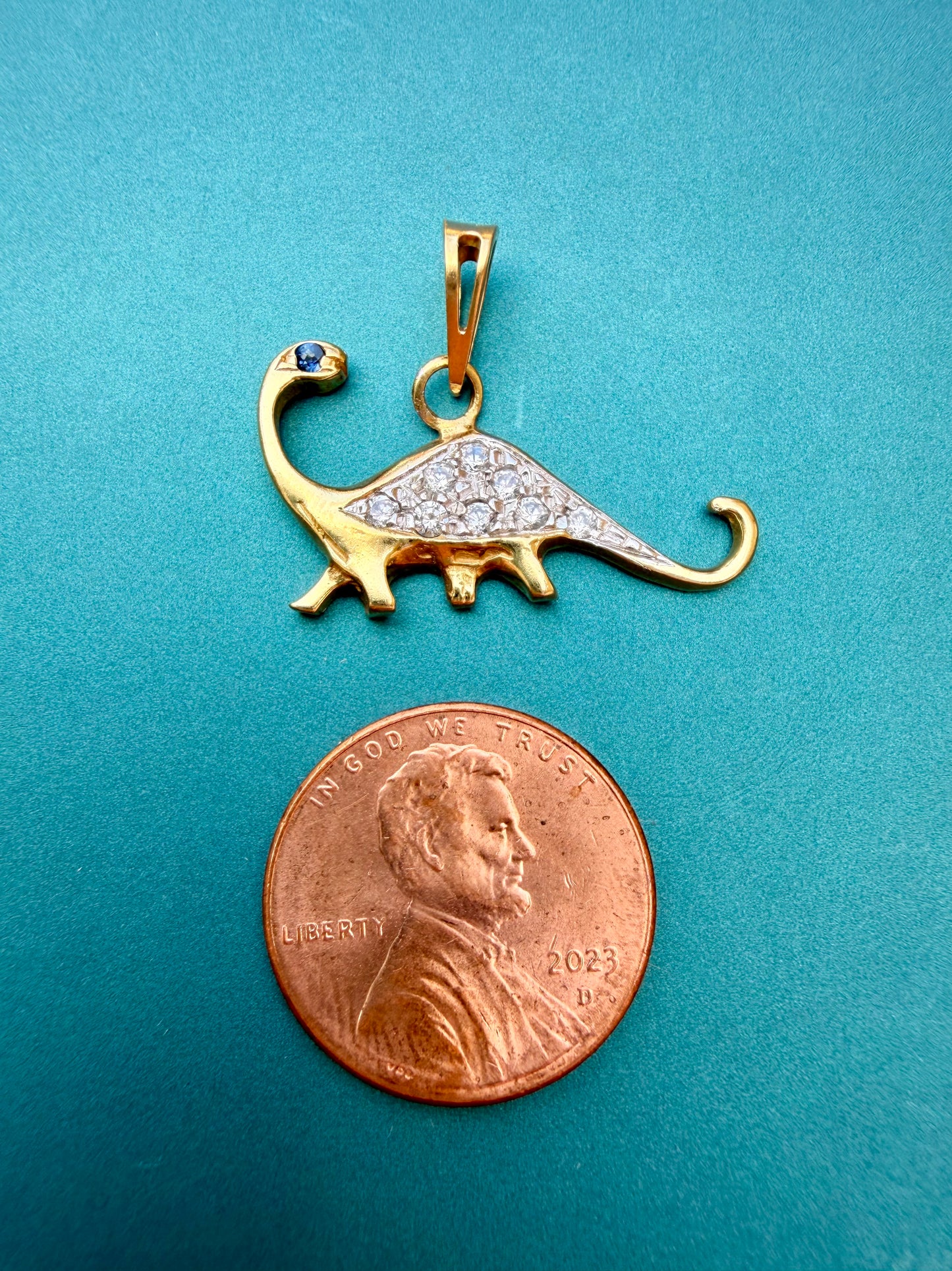 Vintage 18K gold sapphire and diamond dinosaur pendant