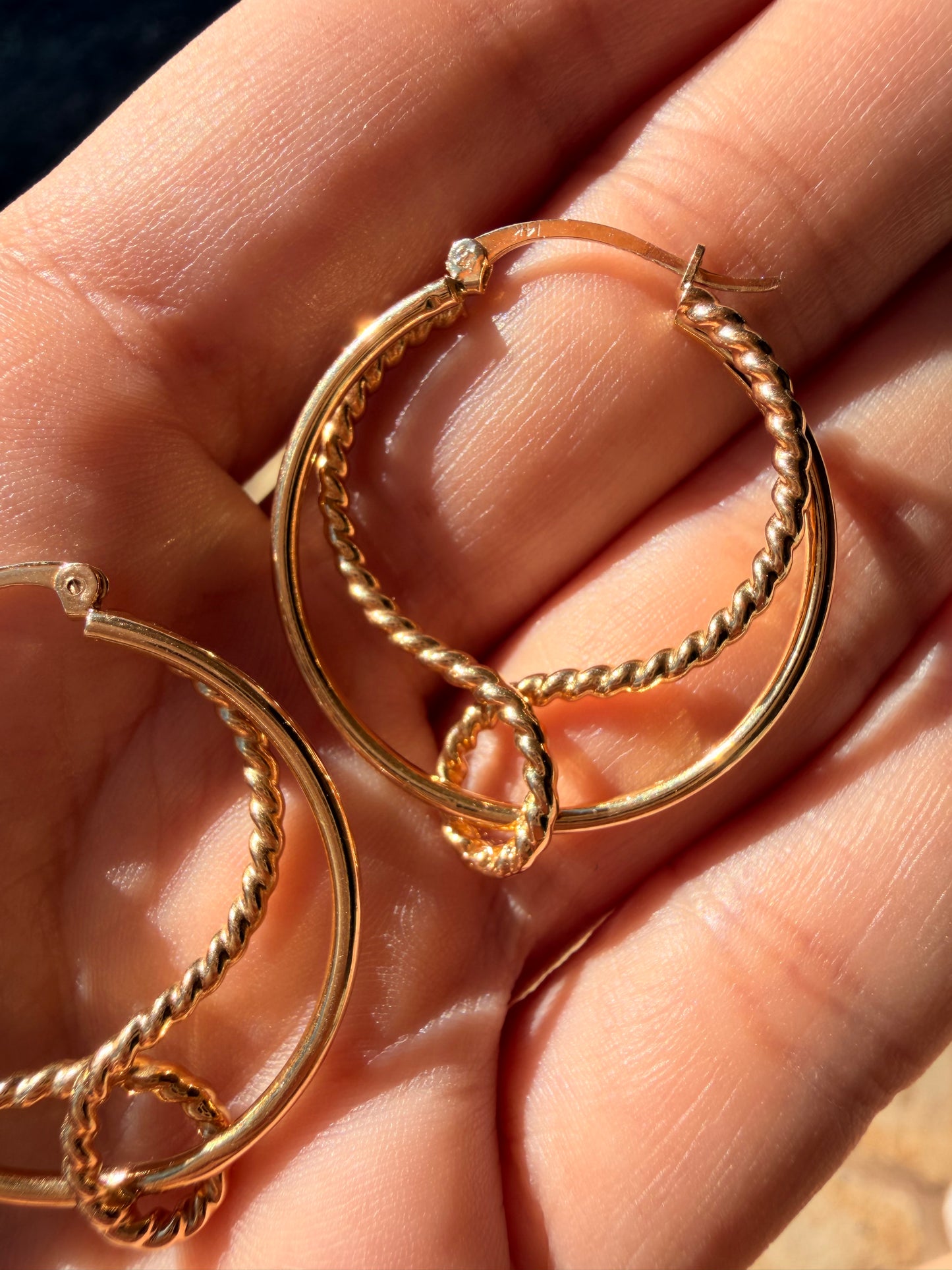 Vintage yellow 14K gold hoops with rope detail