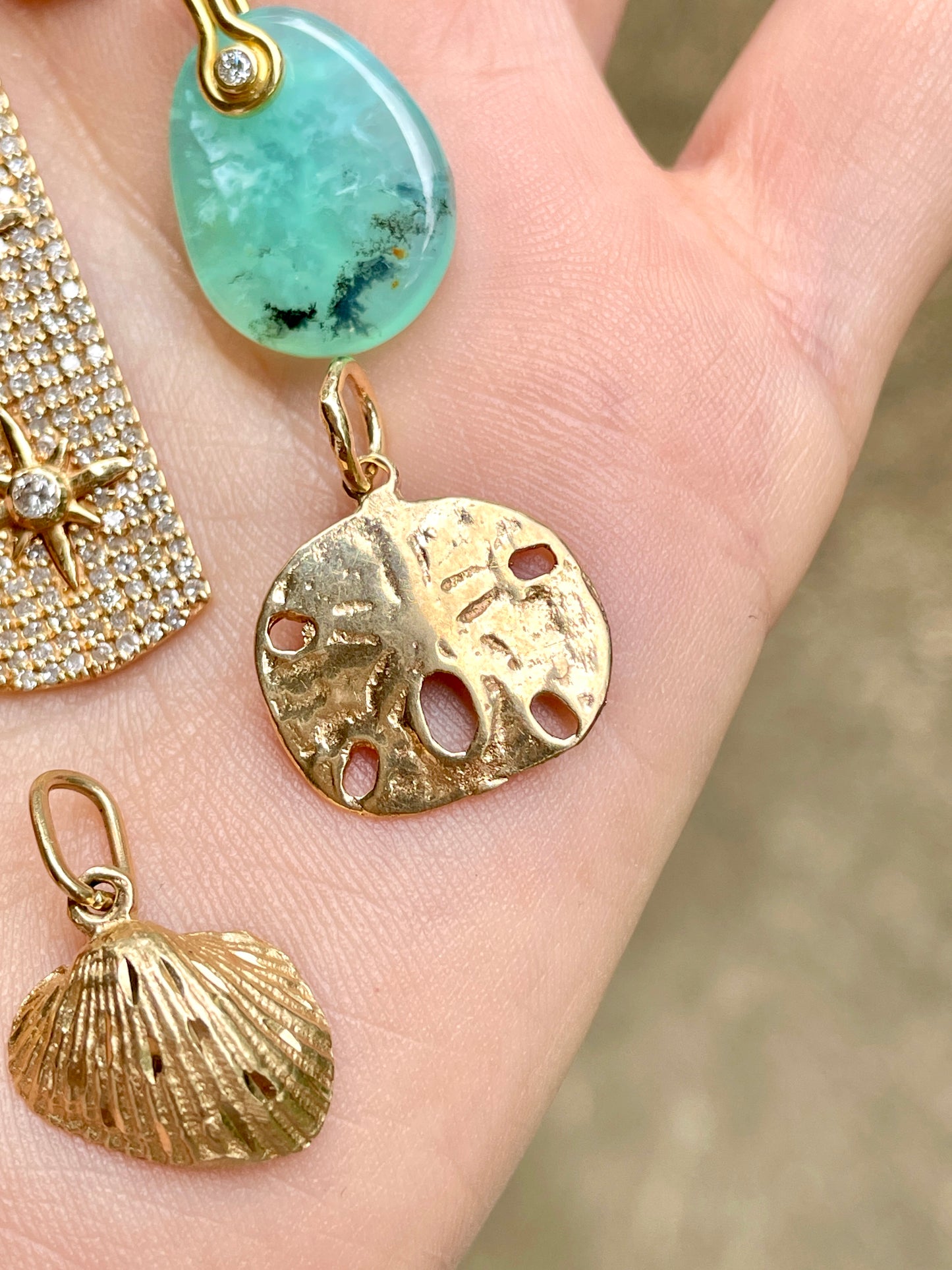 Vintage yellow 14K sanddollar charm