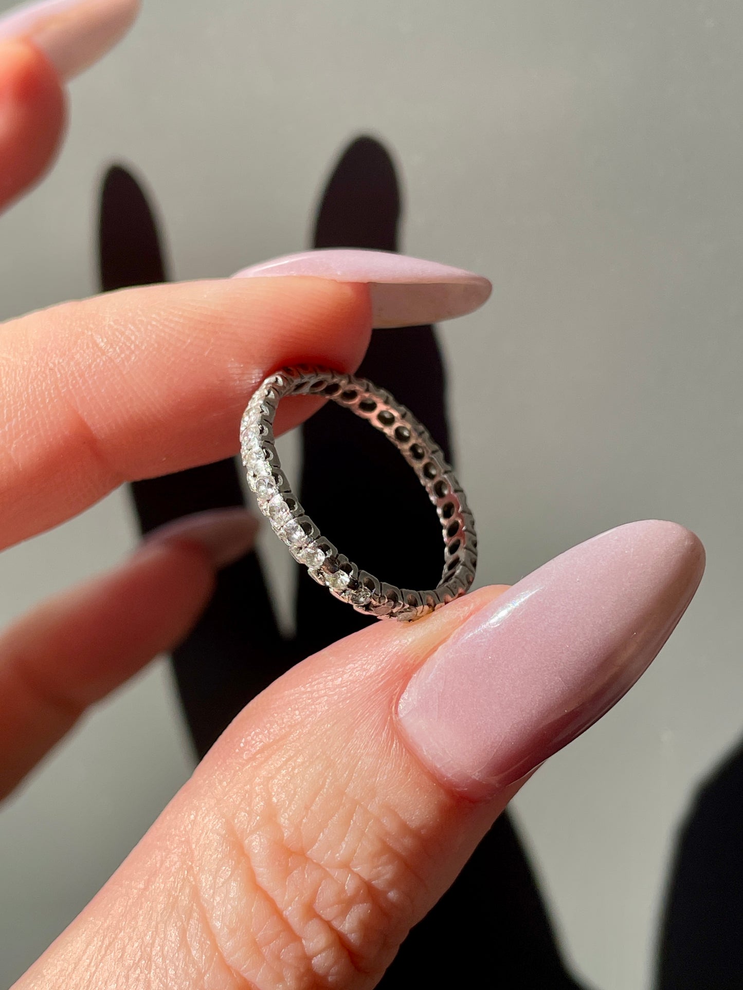 Antique platinum 14K approx .62 ctw diamond eternity ring, size 6.75