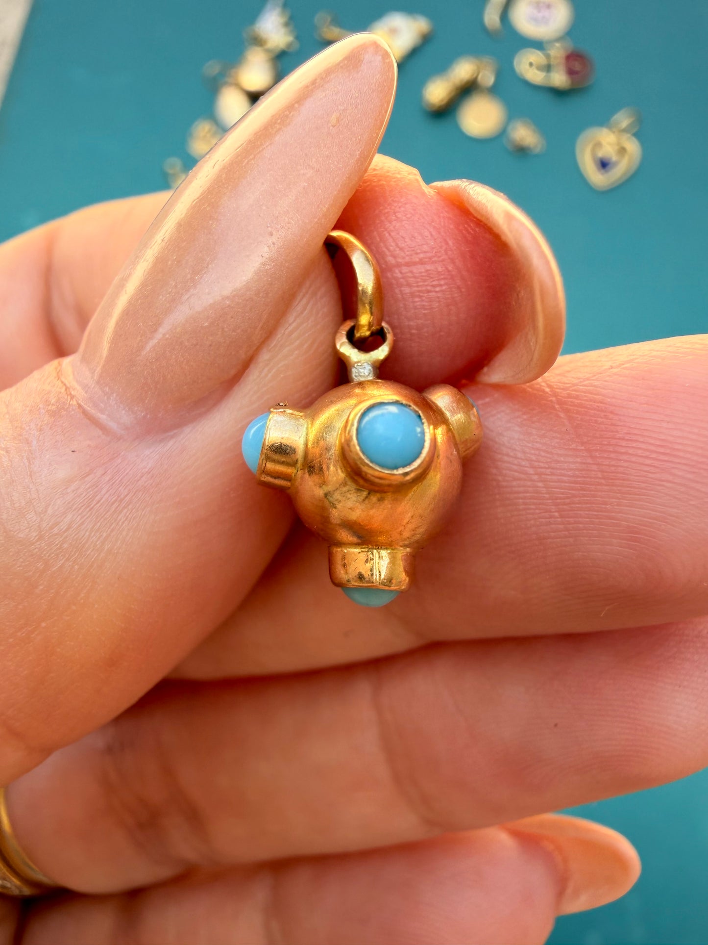 Vintage yellow 18K gold and turquoise sputnik charm