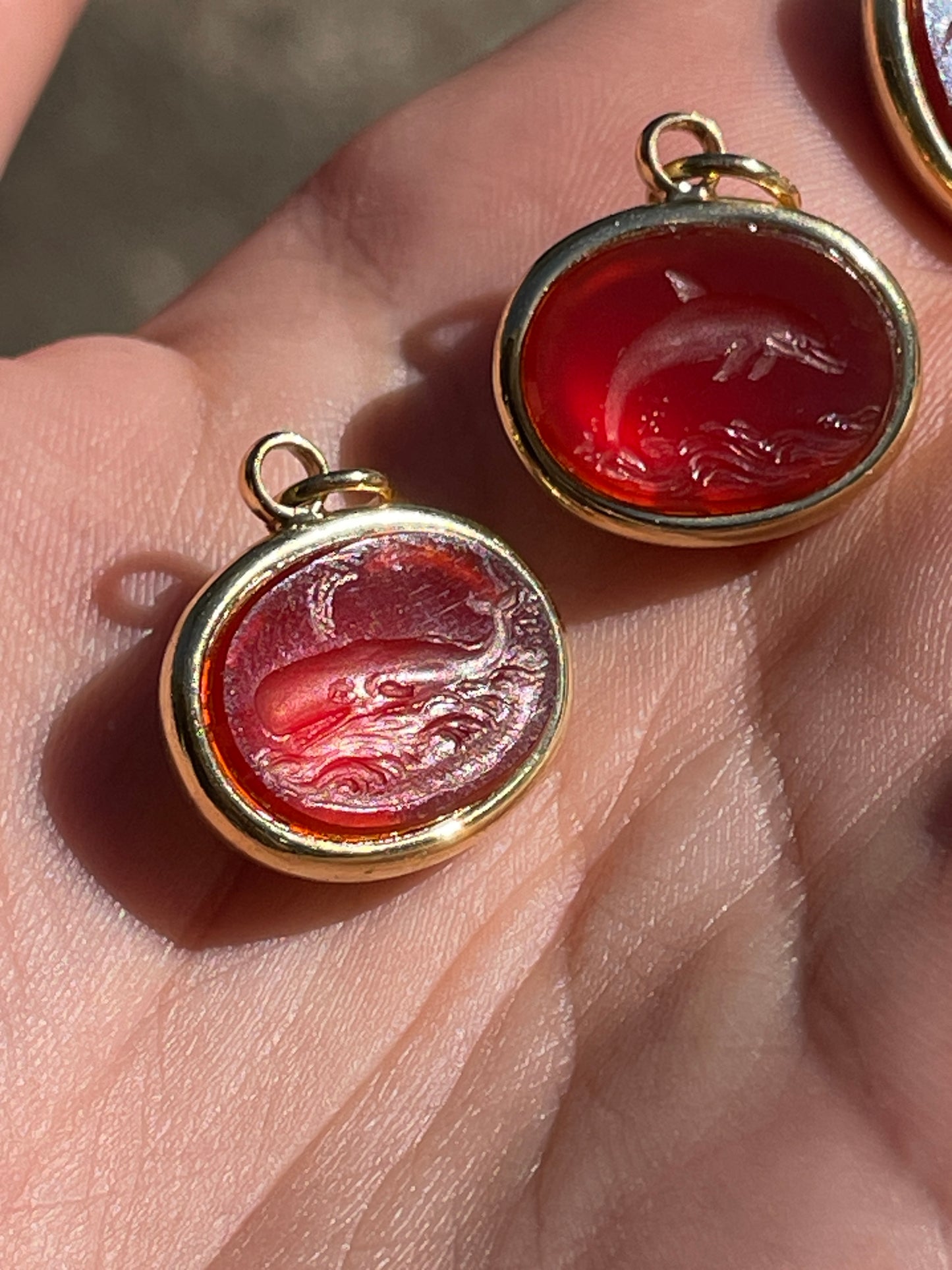 Vintage yellow 18K carved carnelian aquatic animal pebble pendants