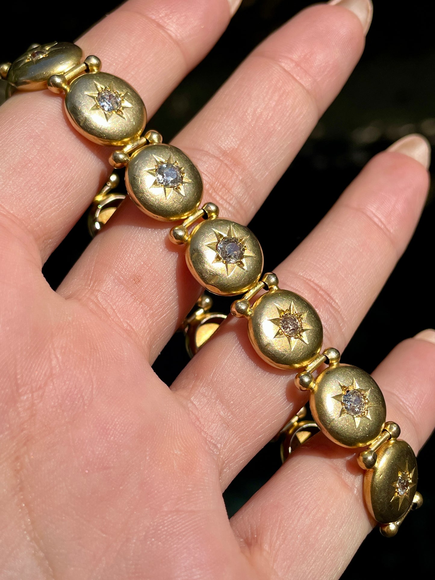 Antique yellow 10K Victorian approx 1.6 ctw old mine cut diamond starburst bracelet, 7 and 7/8 inch