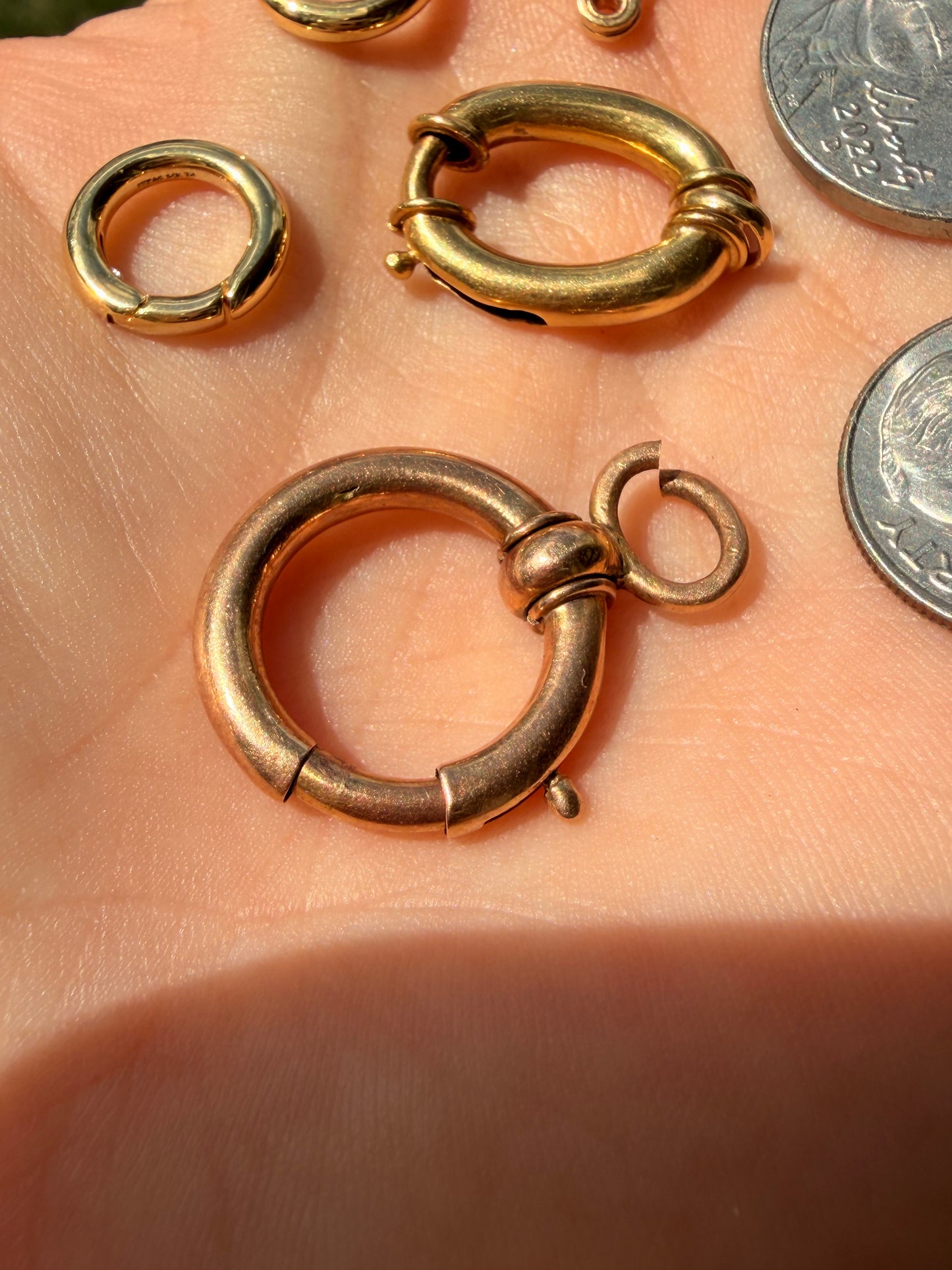 Various solid gold clasps and connectors