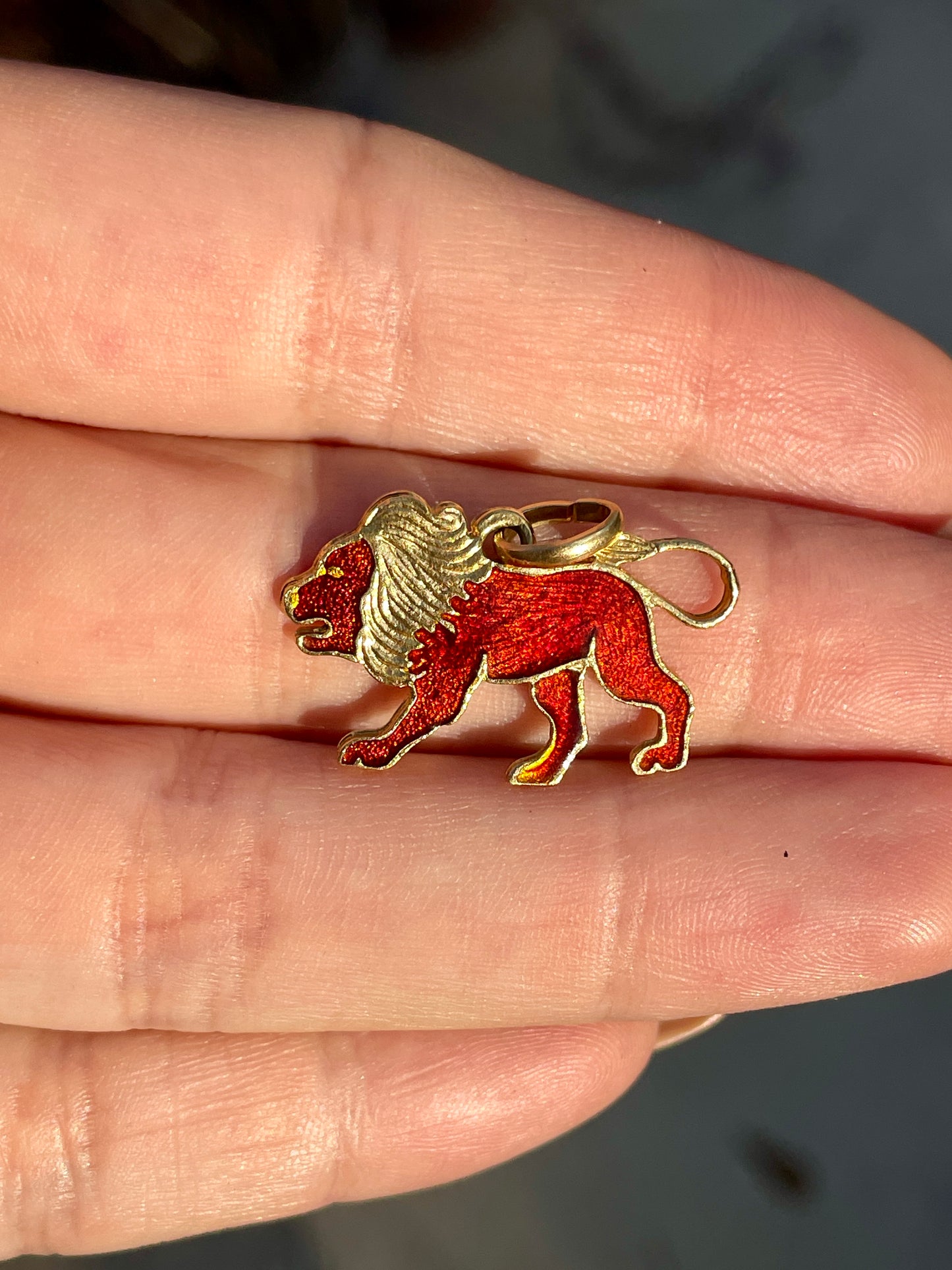 Vintage yellow 18K red enamel lion pendant