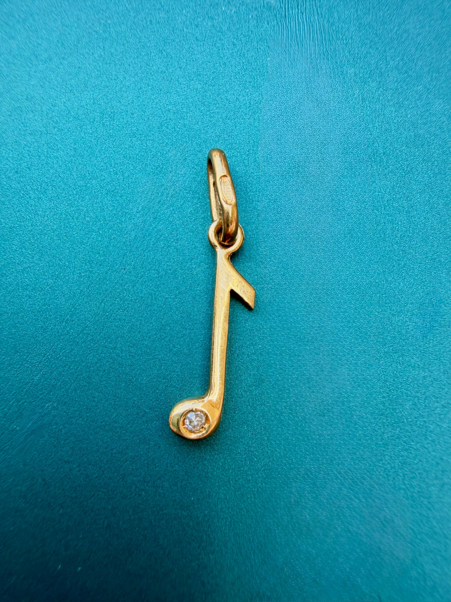 Vintage yellow 18K gold and diamond music note charm