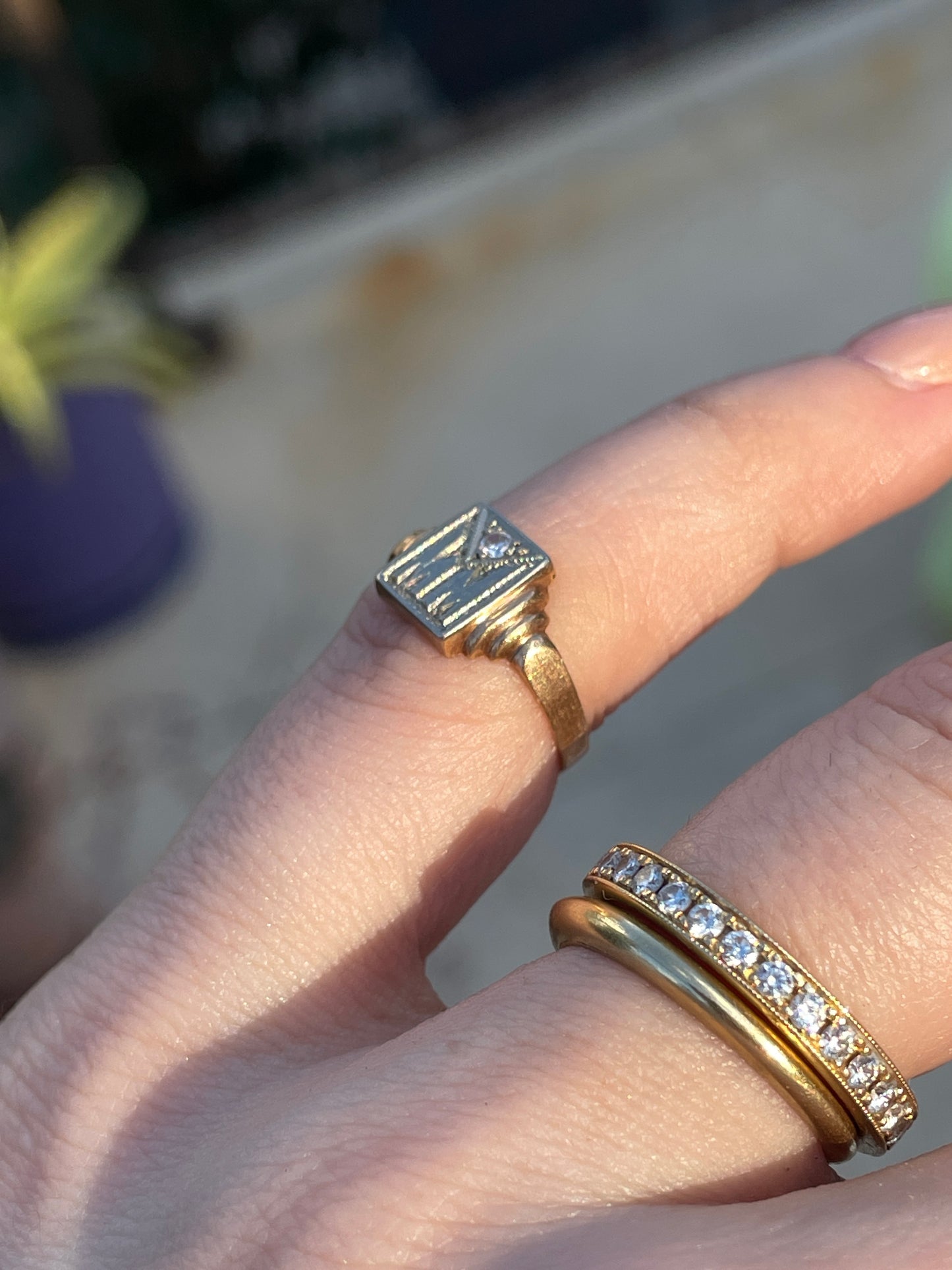 Antique yellow and white 14K "MM" signet with .03 ctw diamond ring, size 3