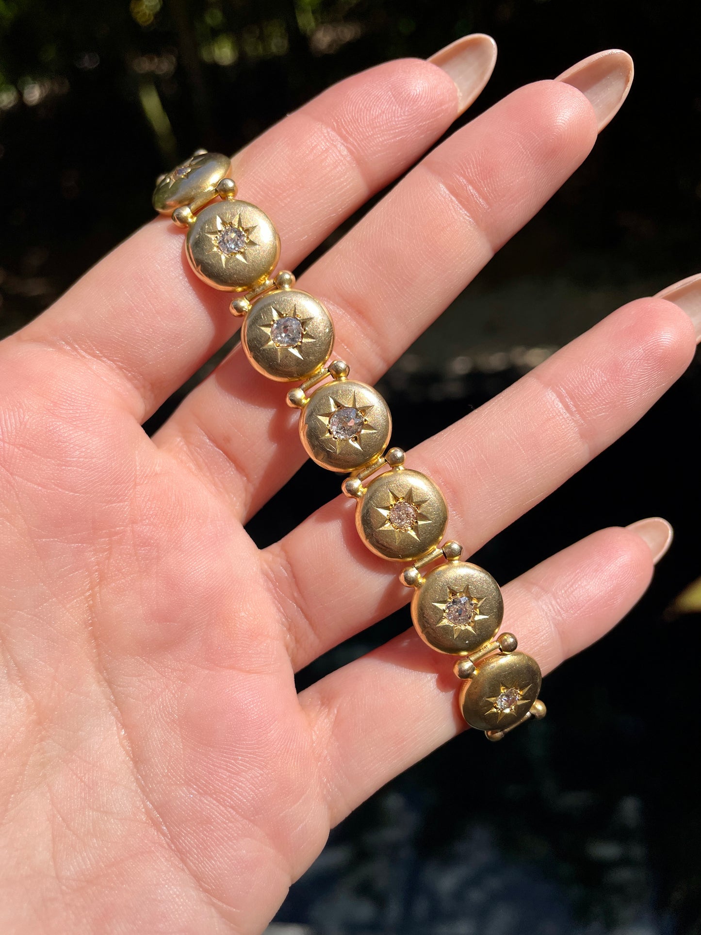 Antique yellow 10K Victorian approx 1.6 ctw old mine cut diamond starburst bracelet, 7 and 7/8 inch
