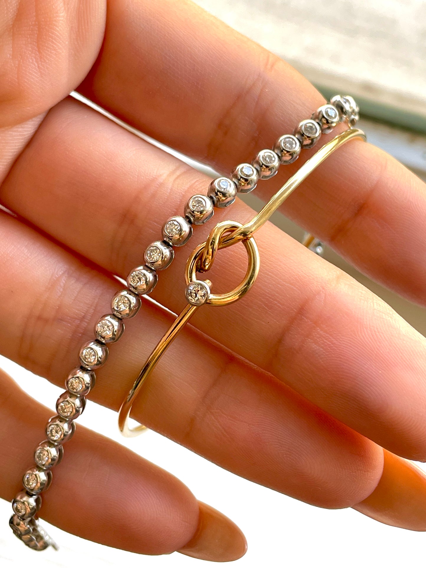 Vintage yellow 14K gold approx .03ctw diamond love knot bangle