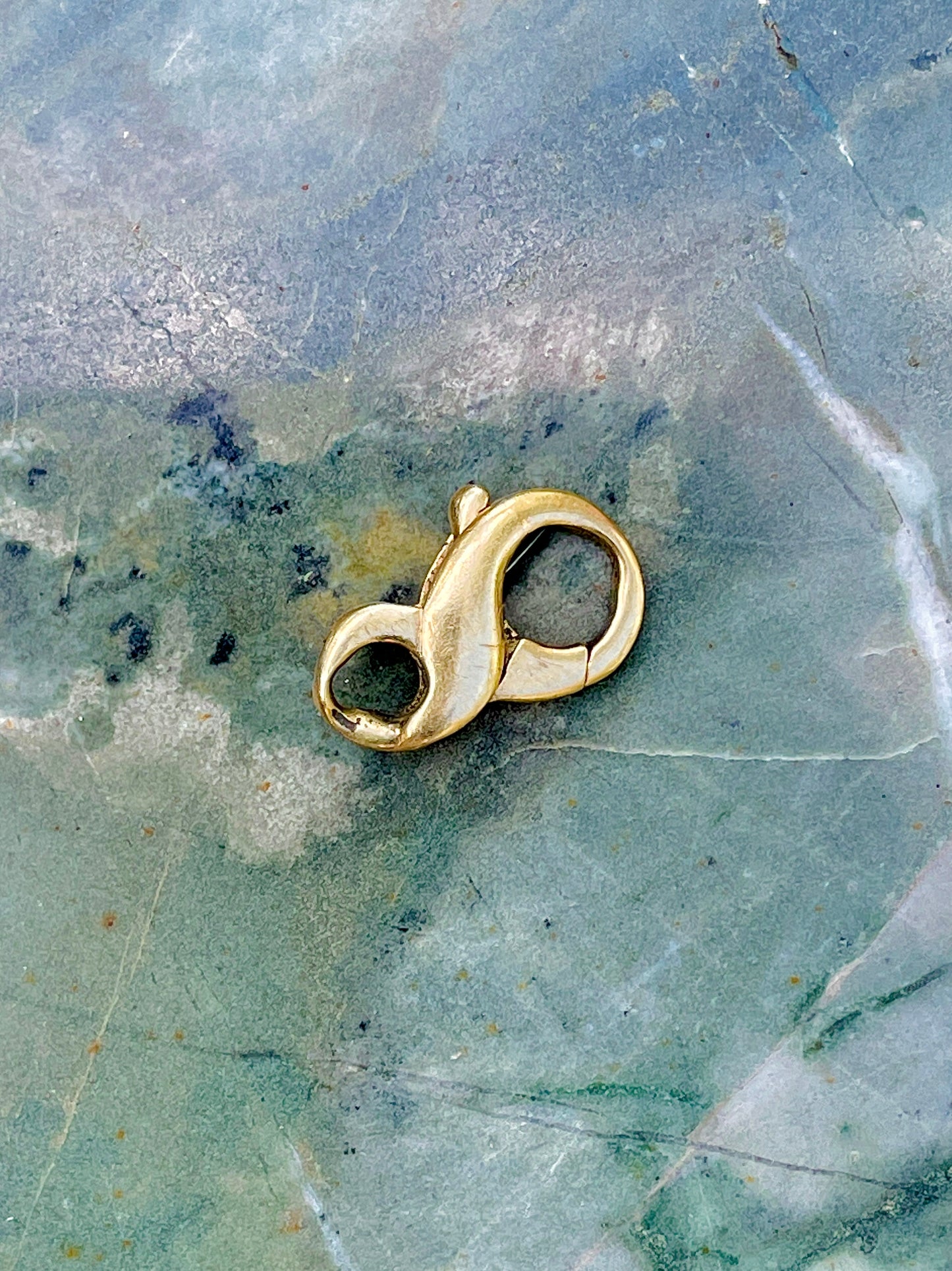 Vintage yellow 14K figure 8 clasp or extender