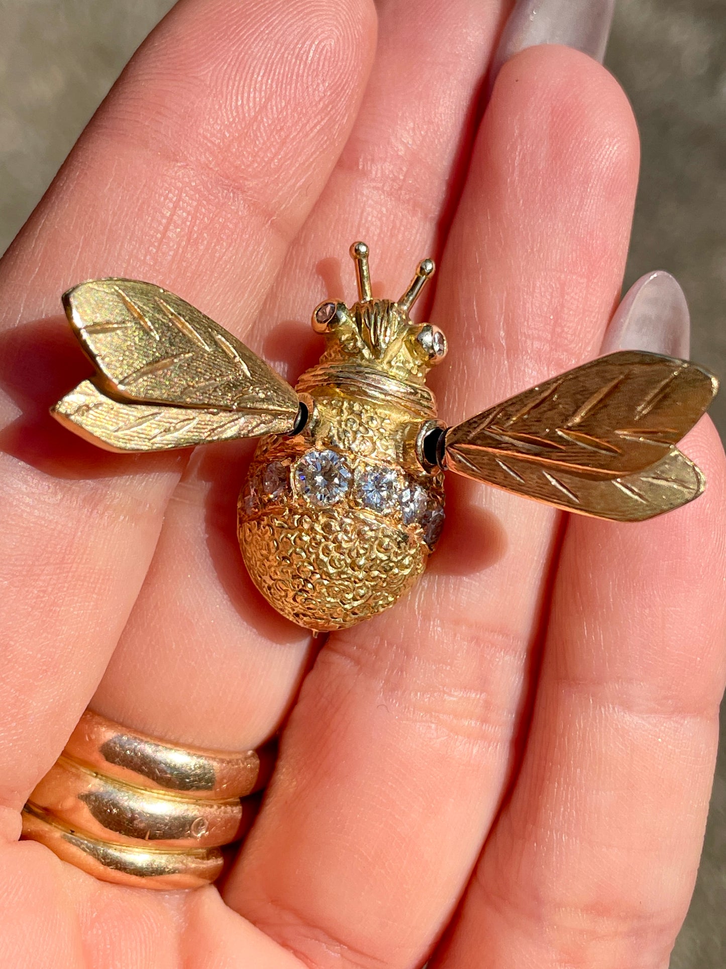 Vintage yellow 18K and approx .6 ctw diamond bee pin with tremblant wings, approx 1 and 5/8 inch