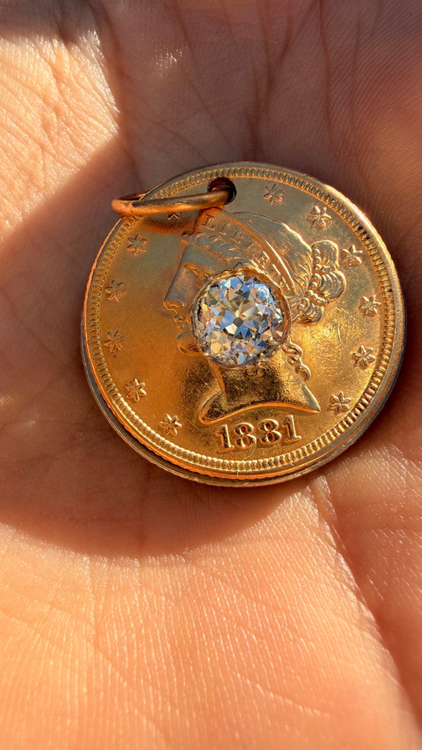 Antique yellow 21K gold 1881 $5 US Liberty coin with approx 1.1 ctw old mine cut diamond pendant