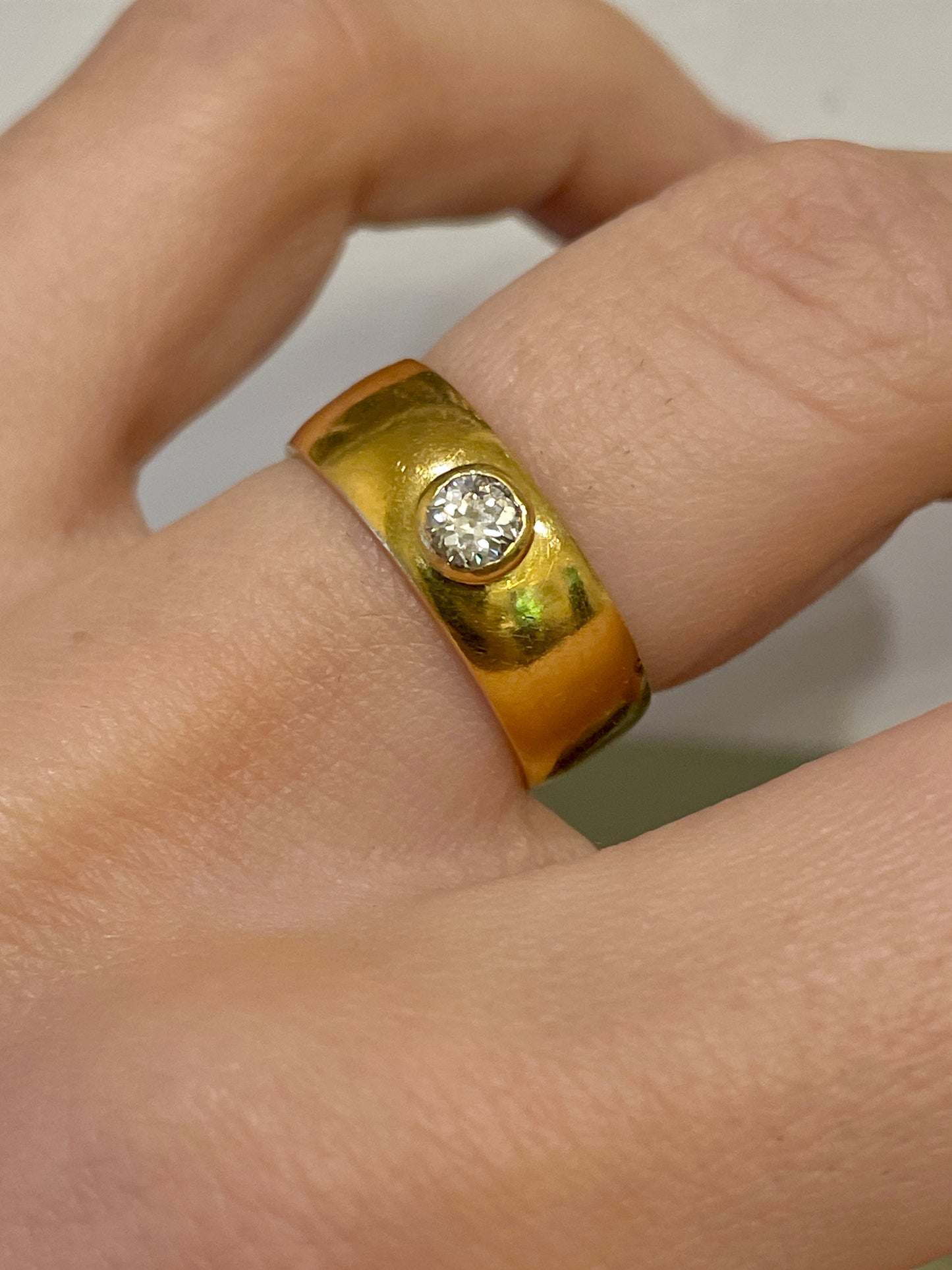 Antique yellow 22K approx .2 ctw bezel set old mine cut diamond band, size 5.5