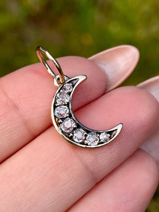 Vintage yellow 14K approx .52 ctw old mine cut diamond crescent pendant