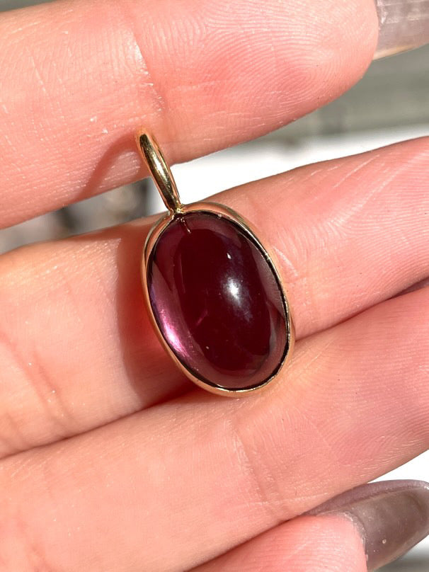 Estate yellow 18K pink tourmaline cabochon pendant
