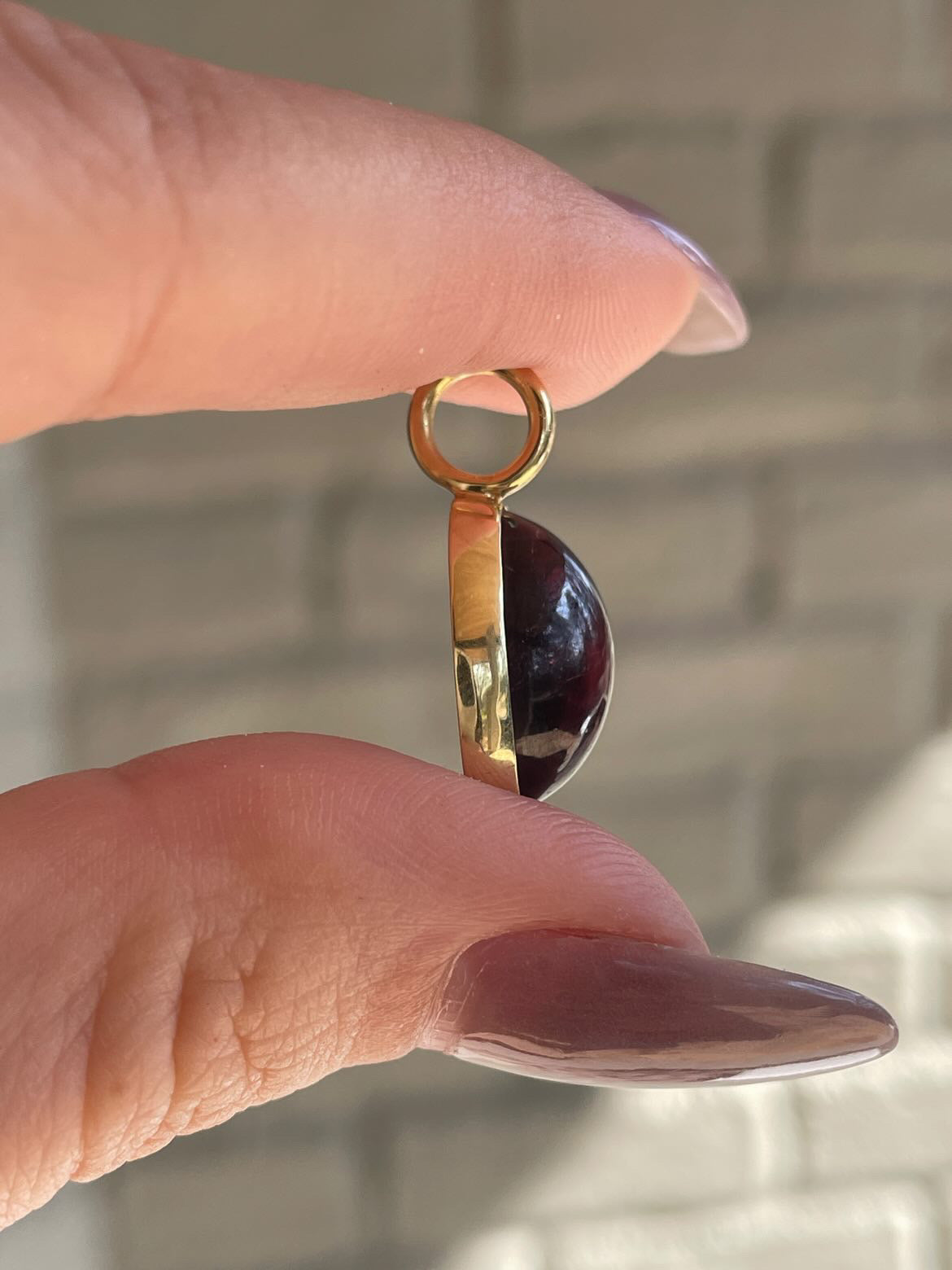 Estate yellow 18K pink tourmaline cabochon pendant