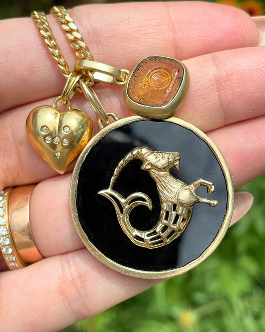 Vintage yellow 14K gold onyx Capricorn statement pendant