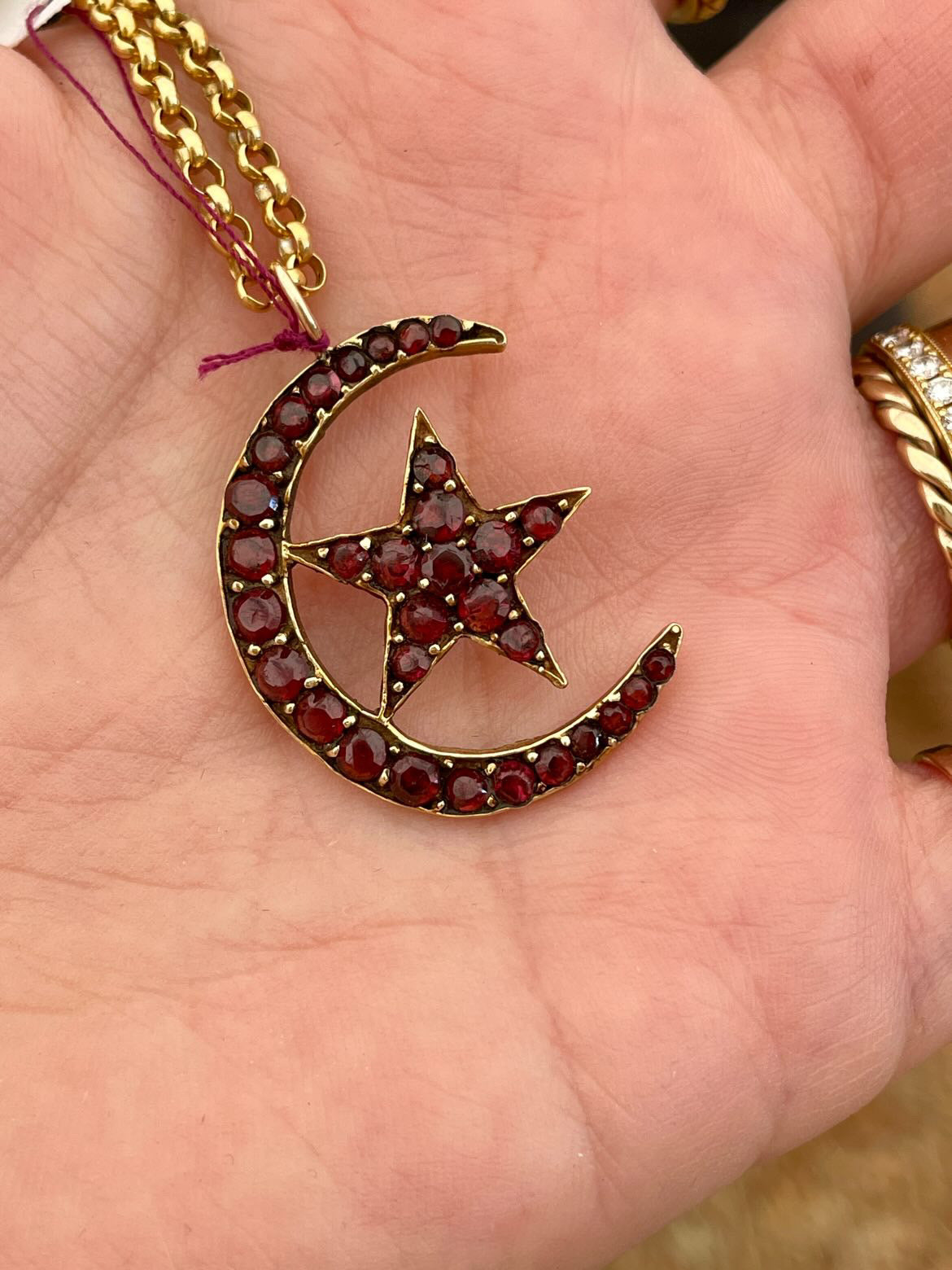 Antique yellow 14K garnet moon and star pendant