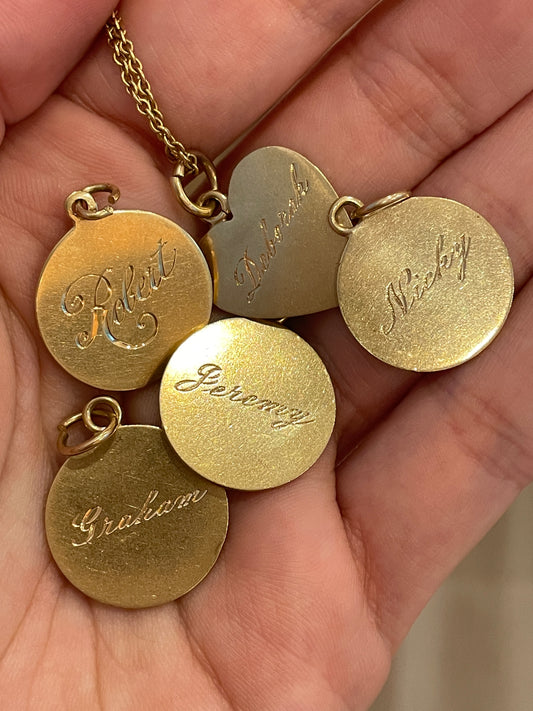 Vintage yellow 14K gold hand engraved name pendants